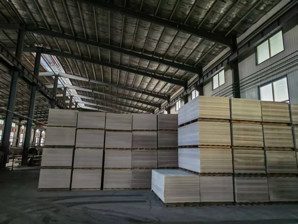 Palletized fiber cement board stock in the factory warehouse