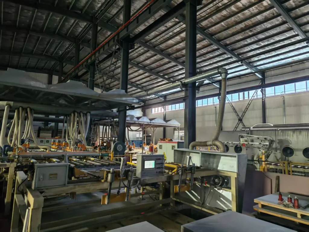 Fiber cement board production line inside the manufacturing facility