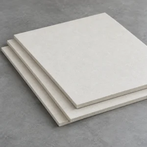 AI visualization of off-white calcium silicate board samples stacked on a grey surface.
